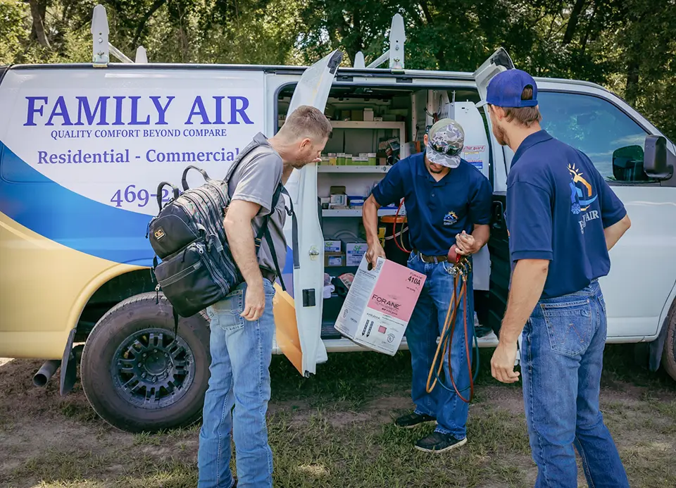 Family Air HVAC Services preparing to install a new system.