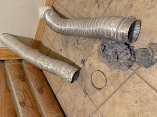 Dryer vent being cleaned out