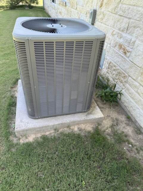 side view of Lennox heat pump before maintenance