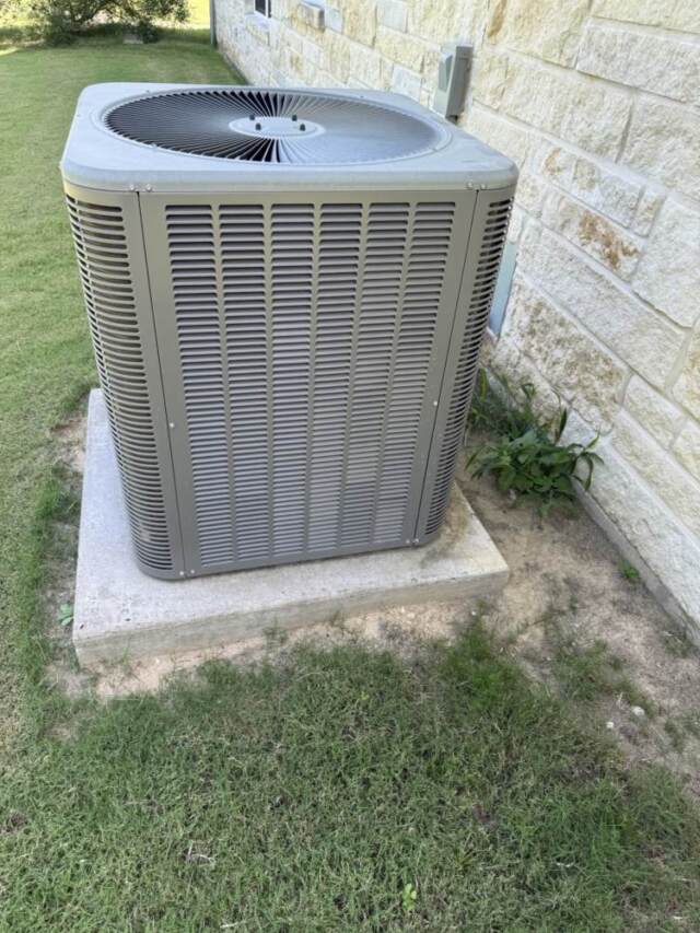 side view of Lennox heat pump before maintenance