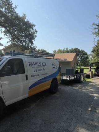 Equipment being unloaded from Family Air van and trailor