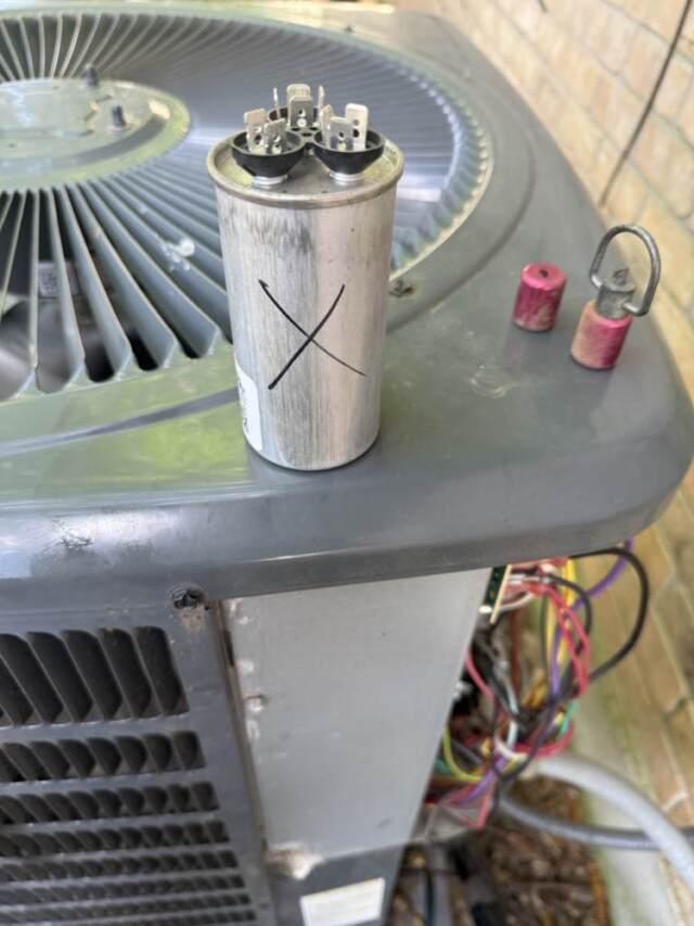 This is the failed capacitor removed from the unit