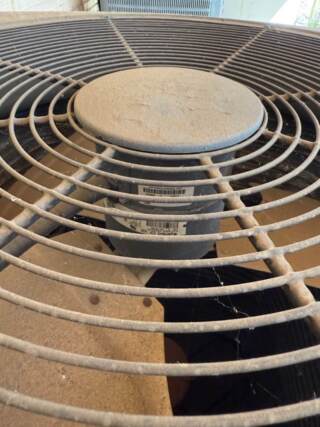 Picture of condenser fan motor inside unit