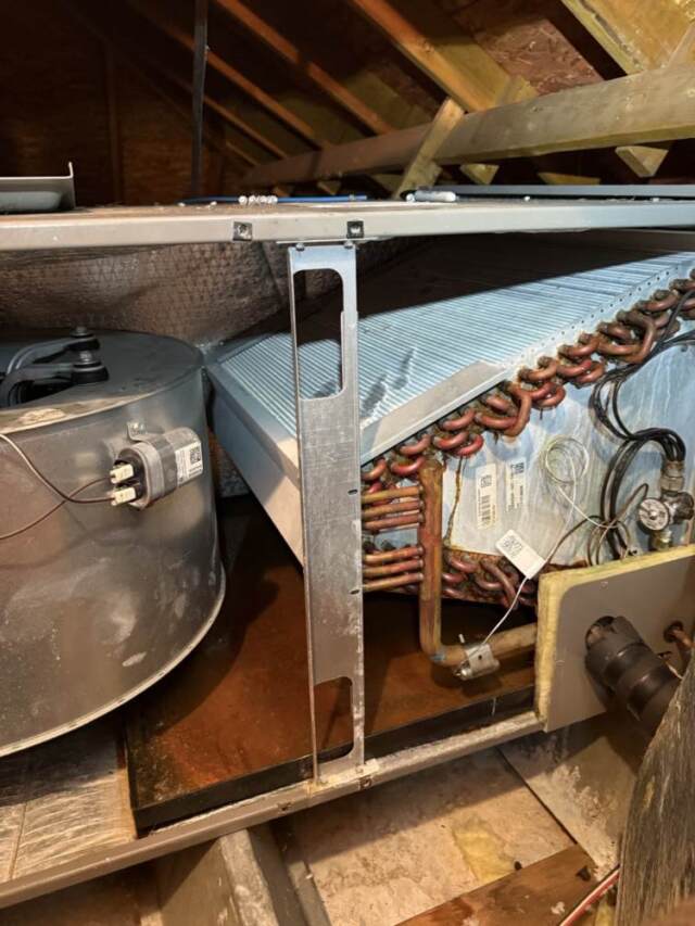 Same picture but after the repair. You cannot see the insulation because it has been strapped up.