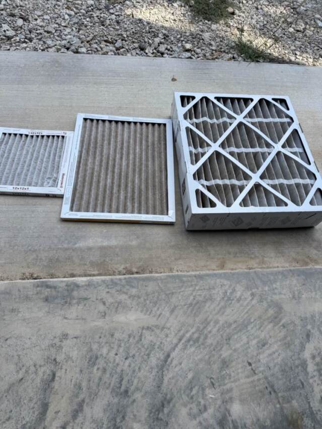 This shows three very dirty different size air filters that have been removed from the units.