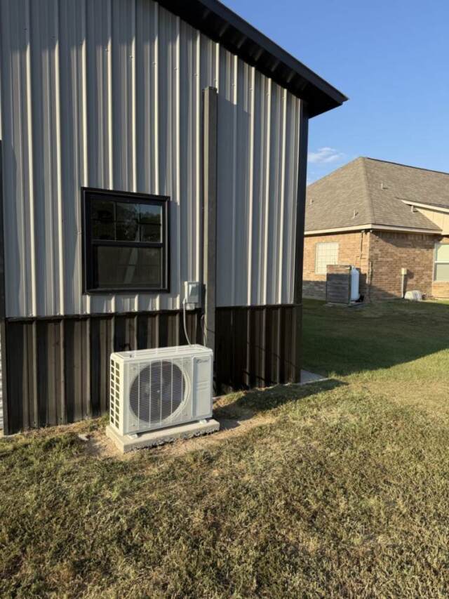 View from outside of shop after the mini split has been installed.