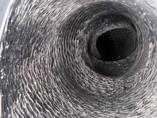 Looking inside the main duct line you can see here a layer of white dust.