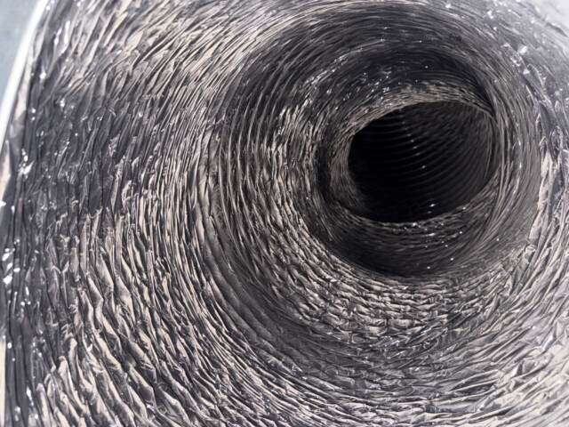 Looking inside the main duct line you can see here a layer of white dust.