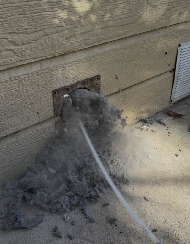 Dryer vent during the cleaning process.