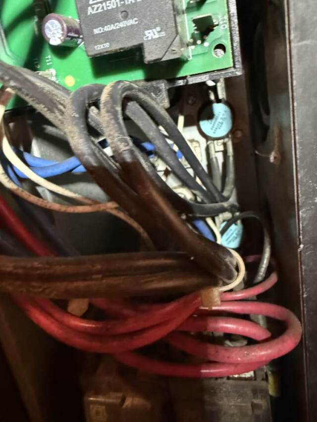 The top blue circle is the faulty limit switch that was replaced