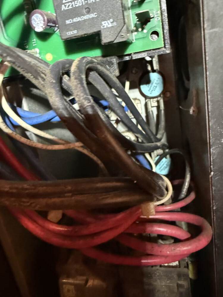 The top blue circle is the faulty limit switch that was replaced