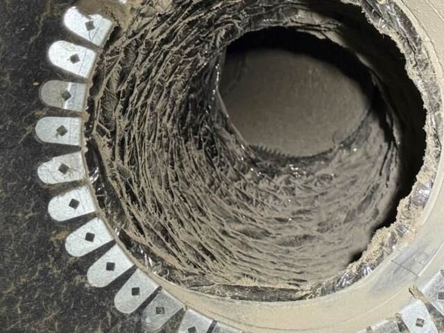 This shows the dirt buildup inside the ductwork.