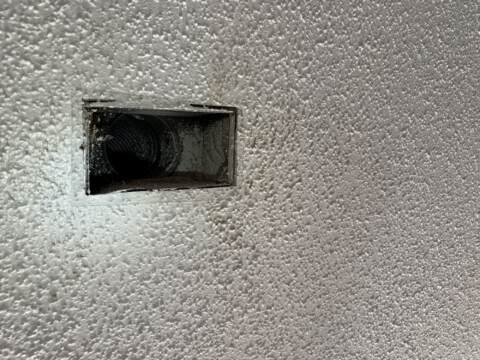 This is the old boot with the ceiling grille removed, this was replaced with a new and larger boot
