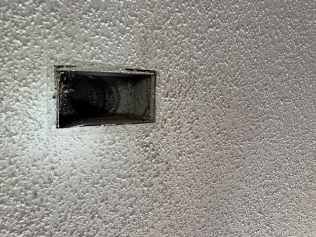 This is the old boot with the ceiling grille removed, this was replaced with a new and larger boot