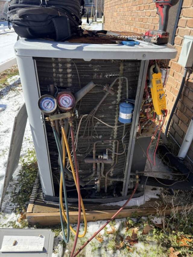 Cover off the outdoor heat pump