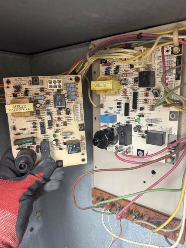 A side by side view of the old control board and the new control board.