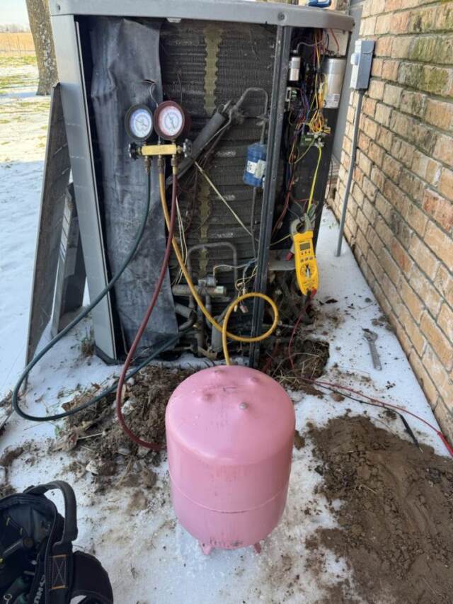 This shows us adding refrigerant to the system.