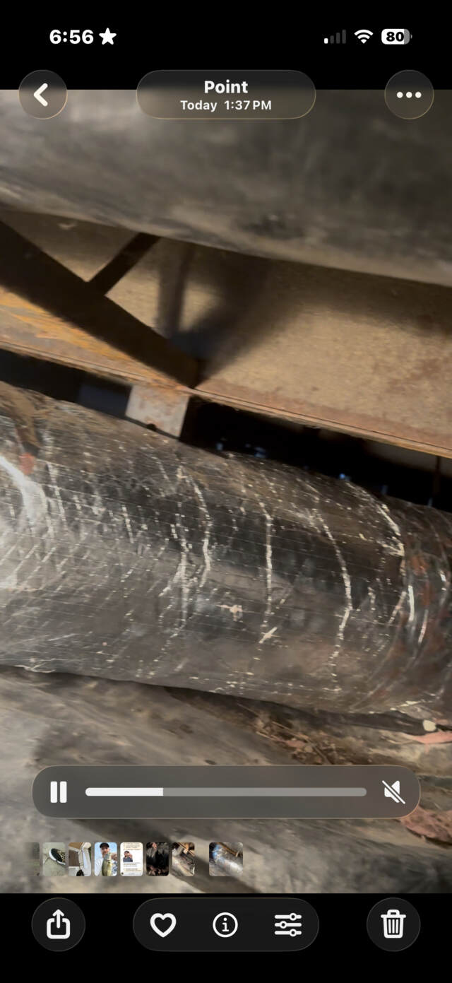 New hard metal duct wrapped with insulation.