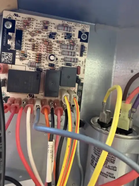 This is the new circuit board after it has been replaced. The old board had burn spots in the middle of the board.