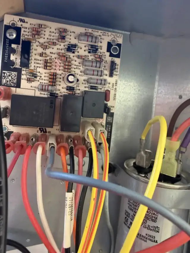 This is the new circuit board after it has been replaced. The old board had burn spots in the middle of the board.