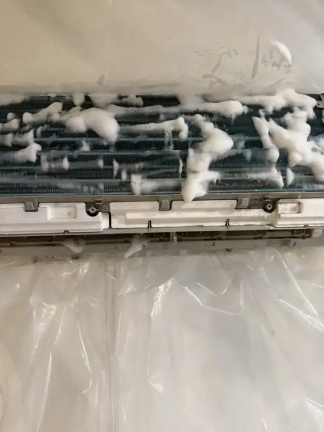 Foaming cleaner sprayed on coil and blower wheel to loosen and push dirt and grime out