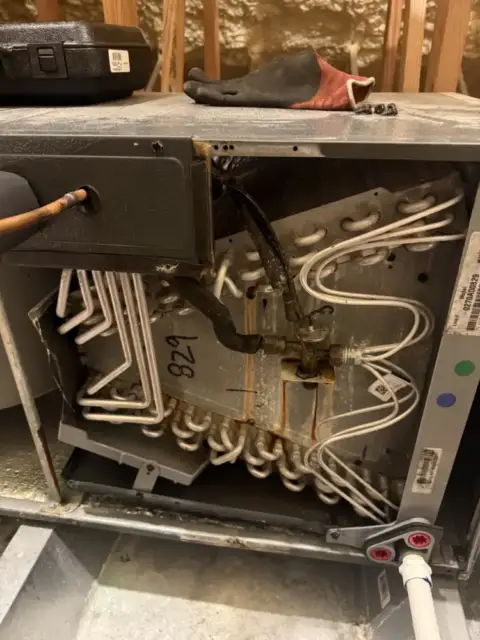 This is the evaporator coil that is leaking refrigerant about the to be replaced with a new coil.