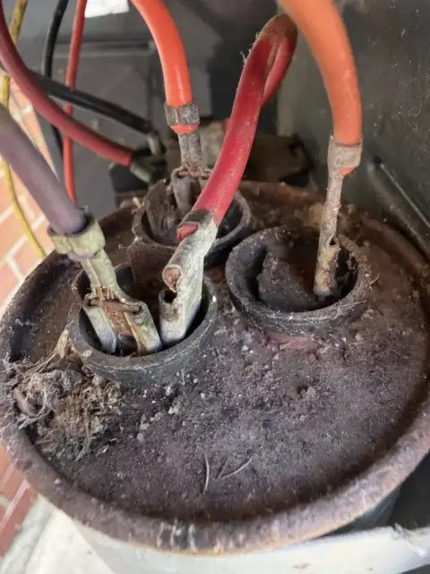old rusty failed capacitor