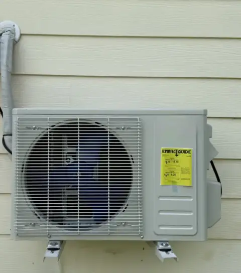 New mini split installation mounted on the wall.