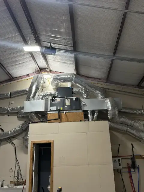A picture of the indoor unit that sits roughly 10 feet in the air on a platform